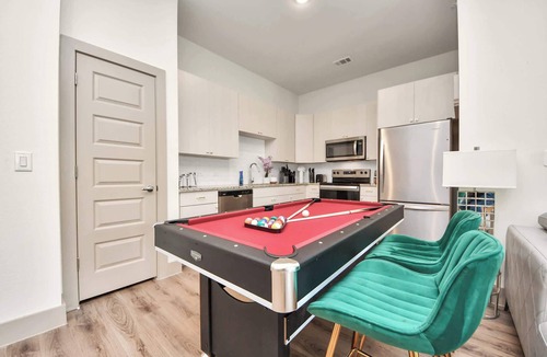 Addicks Apartment | Houston luxury apartment: Pool, gym, game room, and a rooftop deck!