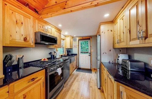 Oxford Cabin | Lakefront home with lovely lake views - one mile from the casino