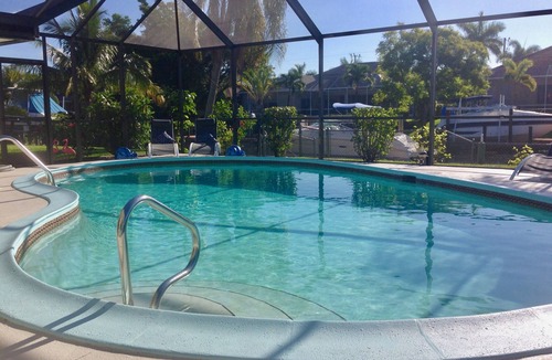 Pelican House | ❤ Large heated pool, free WiFi, gulf access! Discount for members in 2026