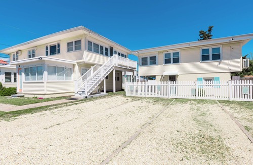 Rehoboth by the Sea Condo | Located Beach Block on Houston Street, 1.25 miles from Rehoboth Beach boardwalk.