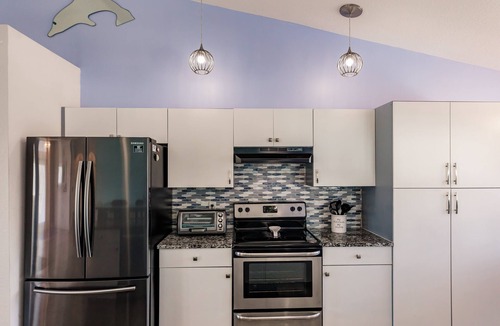 Fort Myers House | Lush Waterfront canal with stuning sunset views, Hot tub and heated pool!