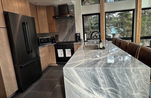 Alyeska House | Luxurious Orca Mountain Chalet - Nestled in Towering Trees with a Private Creek!