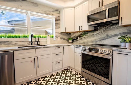 Lauderdale Beach House | LUXURY 4 BD BEACH HOME- 500 Feet to Beach, Heated Saltwater Pool w/Waterfall