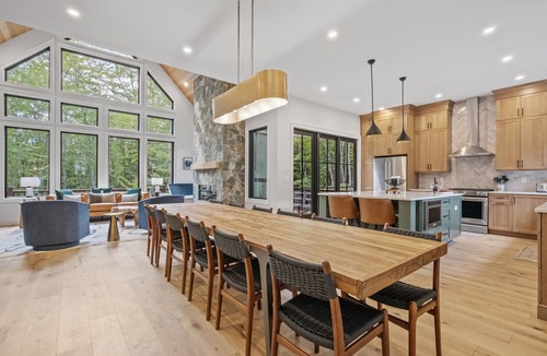 Lincoln House | Luxury 6BR chalet across from South Peak quad. Hot tub, Peloton gym, arcade & pets ok. Sleeps 14.