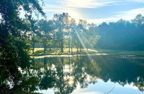 Grovetown House | Masters Rental- Farmhouse with pool, covered patio, & 2 turf greens.