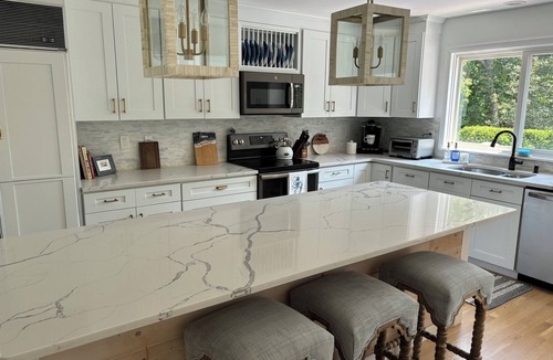 Haversham House | Modern coastal retreat w/pool, close to beaches and golf courses.