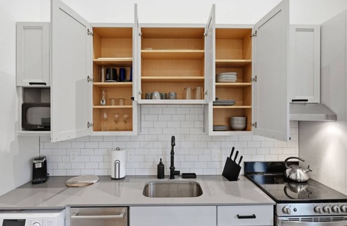 Olde Towne East Apartment | Modern Executive Loft | Work-Ready Mezzanine