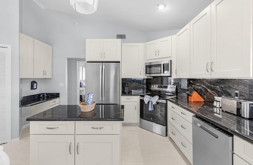 Eight Lakes House | Modern lake front villa w/beautiful views & bikes! Villa Dawn - SWFL Rentals
