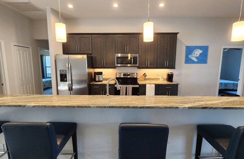 Trafalgar House | New Home - Best in City 4-bedroom house, heated pool on Lake Jolie