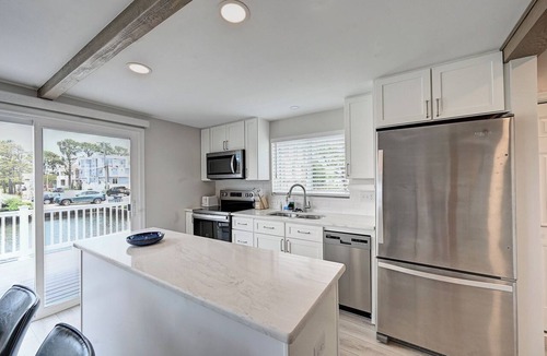 South Bethany House | Newly Renovated 4-Bedroom, 1.5-Bathroom Canal-Front Home in South Bethany Beach; Parking Pass, Free WIFI and 2 Large Decks!