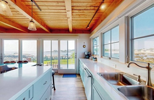 Biddeford House | Oceanfront home with stunning views of the cove & sunset, steps to the beach