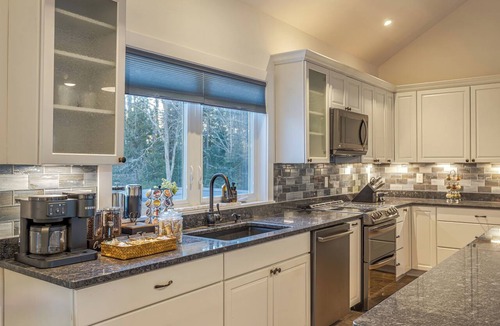 Lamoine House | Oceanfront, mobility-minded home: dock, kayaks, views, hot tub, fire pit + games