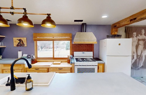 Spanish Valley Cabin | Pack Creek ~ Meadow House: Boho mountain oasis with fireplace, patio views, and stargazing bed