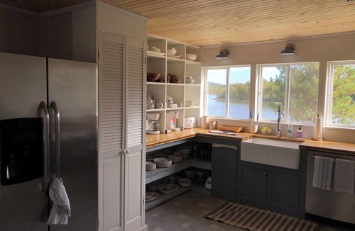 Calais House | Pet Friendly Waterfront home- Kayaks, Game Room, Playset, toddler area & office