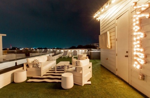Talbot's Corner Villa | Playmate Lounge - Glam Rooftop Retreat | Hot Tub, Putting Green & Skyline Views