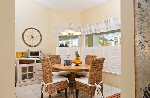 Caloosahatchee Villa | Pretty Waterfront Home w/Heated Pool/Spa + Tiki