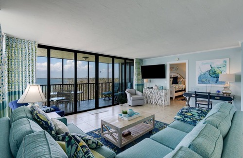 Punta Rassa Condo | Pristine Waterfront Residence with Panoramic Water Views - Pool Open!