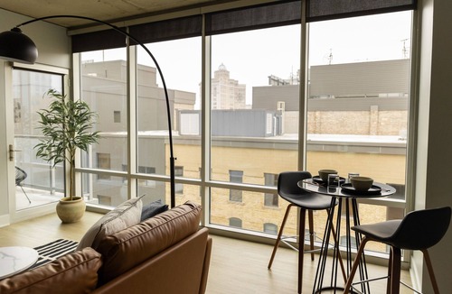 Downtown House | Private Balcony Abstract Apt Dwtn GR w/parking and King Bed