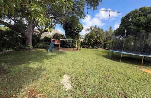 Plantation House | Private pool, family friendly home with playground, BBQ, and spacious backyard.