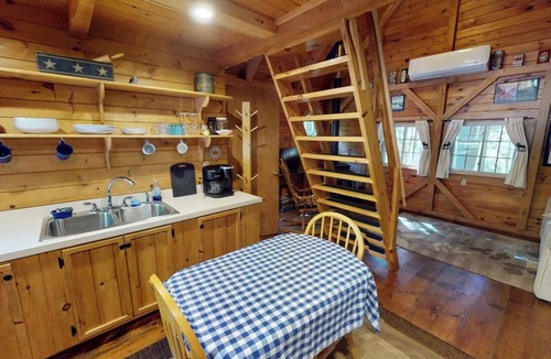 Lincoln Cabin | Quaint 1 Bedroom + Loft/1 Bath streamside Timber Frame cabin near Lincoln, ME.