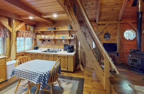 Lincoln Cabin | Quaint 1 Bedroom + Loft/1 Bath streamside Timber Frame cabin near Lincoln, ME.