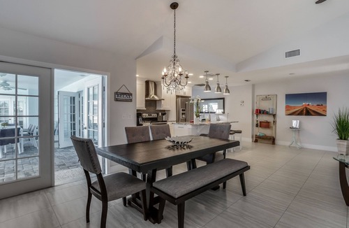 Eight Lakes House | Remodeled waterfront home with pool, lanai, private dock, & WiFi - snowbirds OK