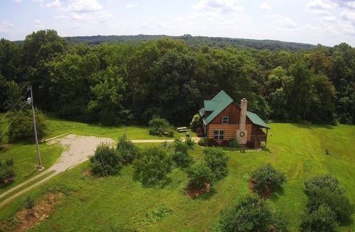 White Cottage Cabin | Rest & relax in a fully furnished cabin on a working orchard and vineyard.