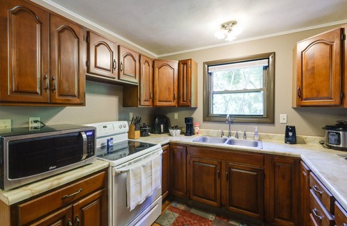 Covington Cabin | Riverfront Covington Cabin w/Deck & Fire Pit!