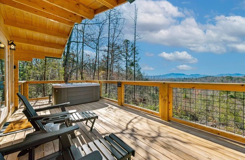 Old Fort Cabin | Romantic Treehouse with Hot Tub, Waterfall, Hiking, Swinging Bridge & Goats
