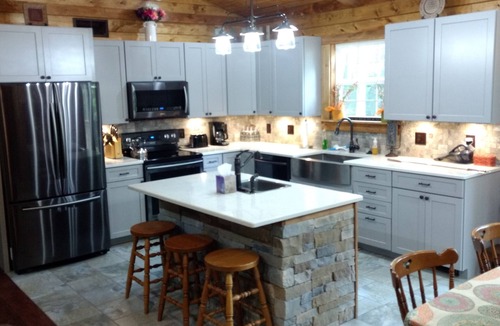 Winchester Cabin | Rustic Cabin with modern amenities and 1 acre stocked Fishing Lake !