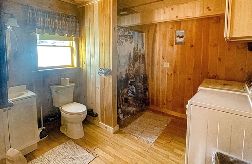 Rockwood Cabin | Rustic dog-friendly lakefront home with private beach, lake views, firepit, AC