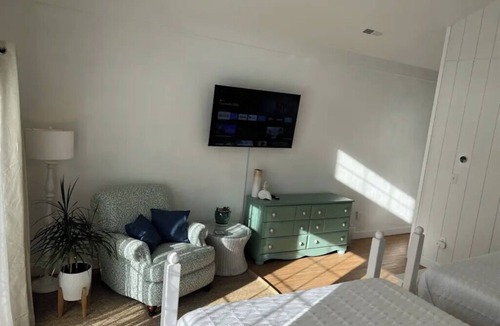 Rehoboth Beach Hotel | Sandpiper Room — Spacious Coastal Luxury with a Private Garden Patio