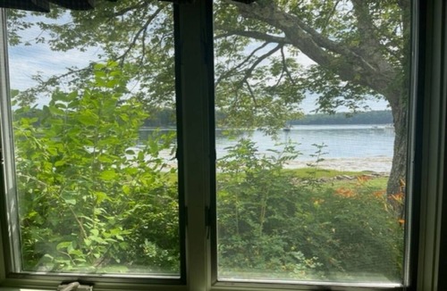 Sebascodegan Island Apartment | Seal’s Haul. Water's edge living in this 1 BR and 1 BA first floor unit.