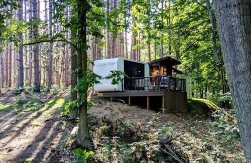 Sears House | Secluded Modern Tiny House with Wood-Fired Hot Tub Near Trails in Sears, Michigan