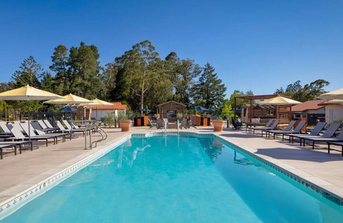 Live Oak Hotel | Serenity Now: Your Santa Cruz Retreat with Deck, Pool & Fireside Relaxation