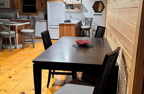 Steuben Cabin | Shoreline solitude, rustic, nestled between evergreens and Pigeon Hill Bay