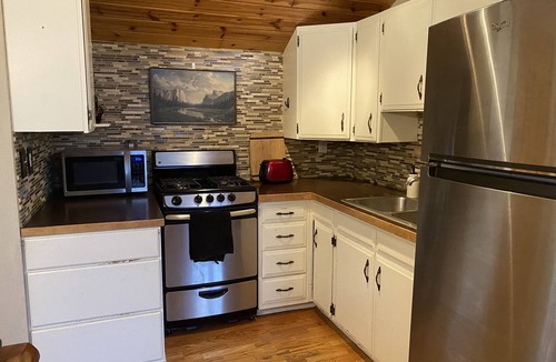 Eagle River Cabin | Sleeps 26 ! Log Cabin, Chalet & Apartment & Hot tubs !