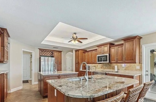 Caloosahatchee House | Spacious 4-bedroom house in charming Cape Coral neighborhood.