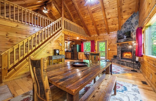 New Plymouth Cabin | Spacious Log Cabin with Hot Tub, Fire Pit, Large Decks & Wood Fireplace