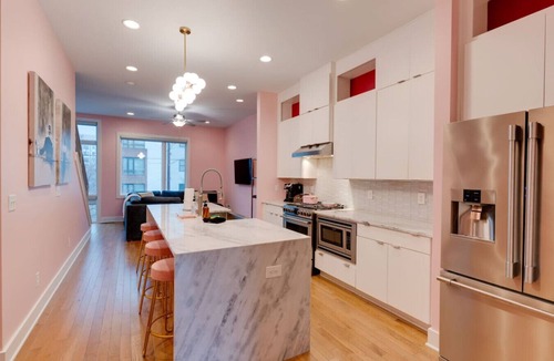 Edgehill Villa | Spacious Pink Palace townhome near The Gulch with rooftop and balcony