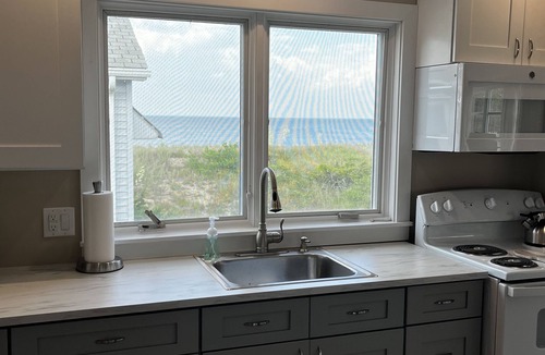 Broadkill Beach Cottage | Steps to the Beach. Pet-friendly cottage with a great view of the water!
