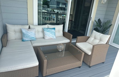 Heron Harbour Isle Condo | Stunning Waterfront 3BR condo with Pools! Discount AND linens for 7 nights!