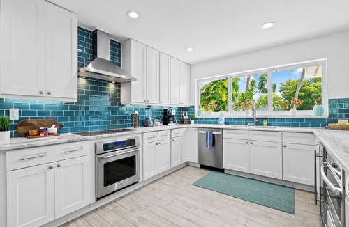 Coral Shores House | Stylish Modern Tropical Waterway Retreat with Private Pool Near Beaches!