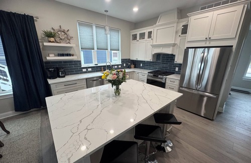 Russells Point House | SUNSET RETREAT-Luxury 4BR, 4.5BA waterfront, boat lift, best sunset on the lake!