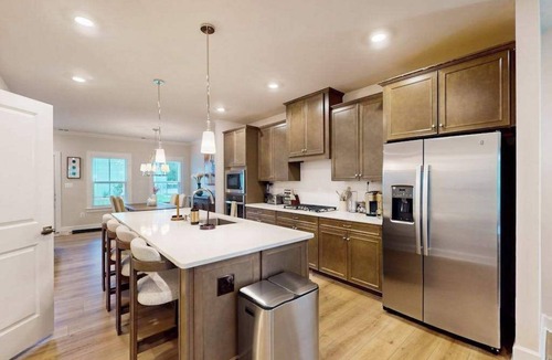 Long Neck House | The Peninsula spacious home w/community pool, hot tub, tennis courts