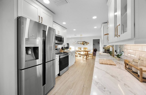 Biggar House | Tropical Escape with Heated Pool in Whiskey Creek - Close to Beach & Downtown