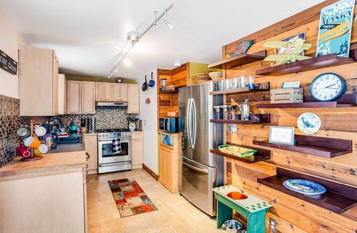 Girdwood House | Two-story, dog-friendly retreat with deck, fireplace, W/D, & mountain view