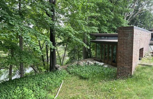 Alaska Ski Chalet | Usonian Frank Lloyd Wright Inspired River House on the Thornapple River