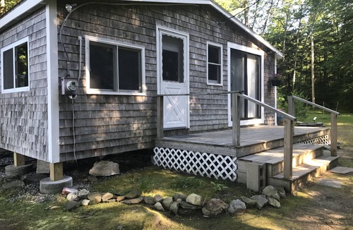 Winthrop Cabin | Walk out beach in private cove on Cobboossee Lake