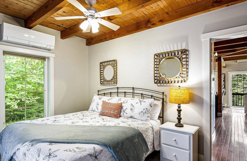 Eddington House | Water-view home with dock, fireplace, central AC & washer/dryer - dog-friendly